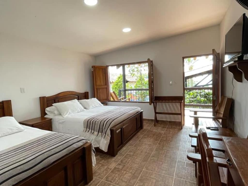 Hotel Bosques Del Saman Alcala 킴바야 외부 사진